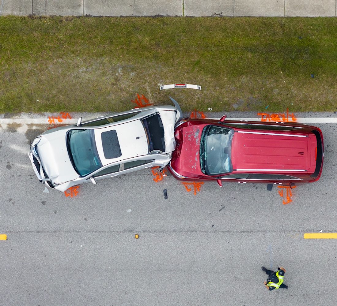 Car crash with two vehicles collided at traffic accident site on American street by bilanol
